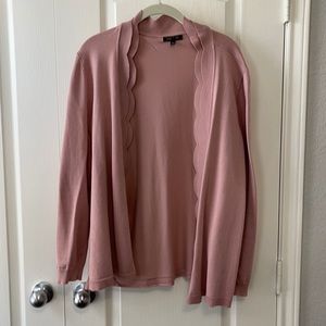 Pink cardigan with scalloped detail